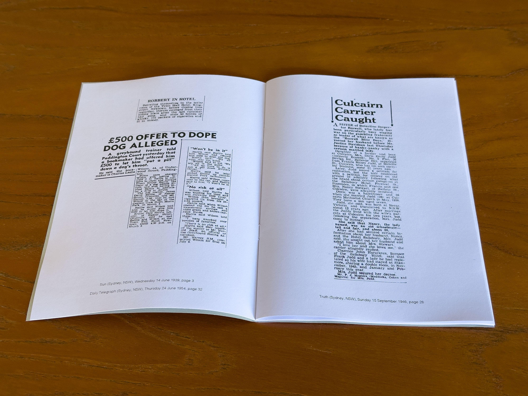 A spread from a zine featuring historic news stories.